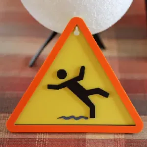 Caution, slippery ground / Attention, sol glissant