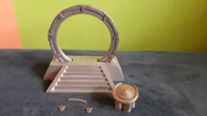 Stargate in an off-world pedestal with a DHD