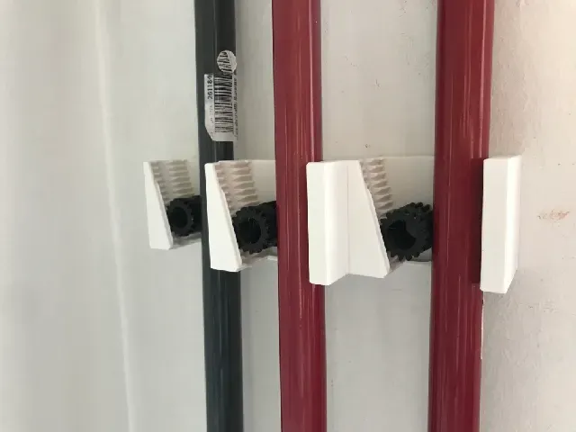 Triple & quadruple gravity broom holder + gear for smaller diameter broom sticks