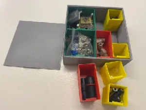 Stackable box with locking lid and inserts