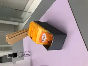 Sugar bag container with coffee stirrer container