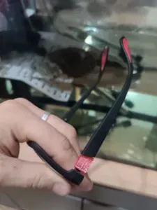 the arm of the glasses\the hinge of the glasses