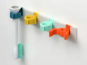 Compliant Mechanism Clip Wallmount for Tape