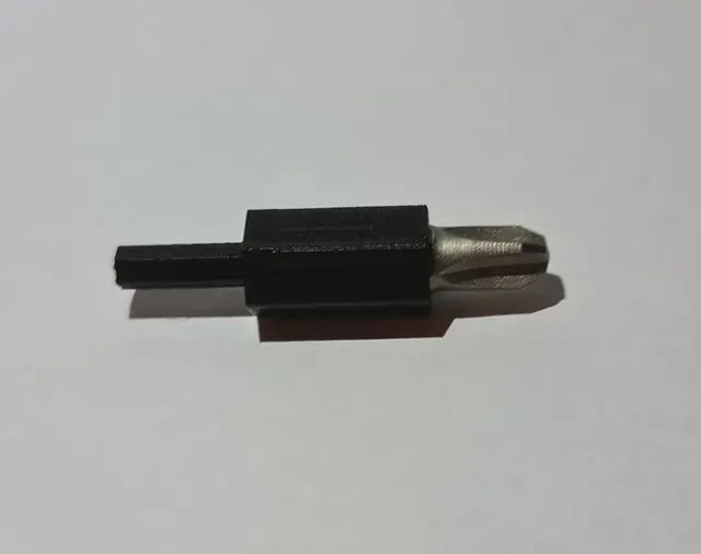 Configurable driver bit adapter (use larger bits in a smaller driver)