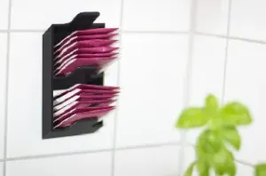 Wall mounted tea bag dispenser