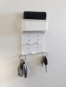 Light switch plate w/ key hooks & wallet pocket
