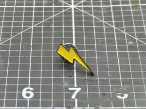 Lighting bolt enamel pin