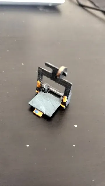 Miniature 3d printer, no supports needed