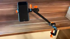 Variable mobile phone holder with clamp