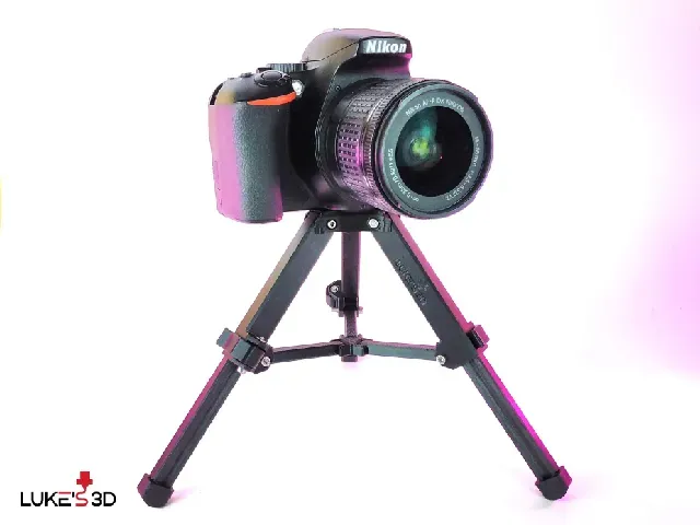 Foldable telescopic snap lock camera mini tripod