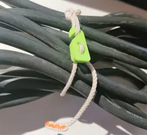 Quick-release paracord tensioner / ty-rap replacement