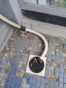 AC drain line to drain cover