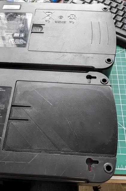 Battery cover for APC uninterruptible power supply