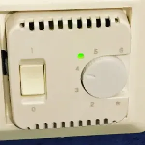 Knob for under floor heating thermostat