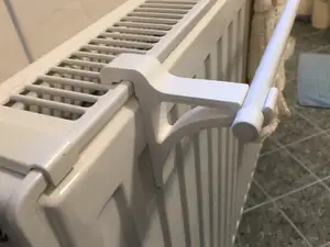Radiator hooks for towel rail