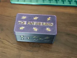 The Answering — a co-operative board game for PlayGrid