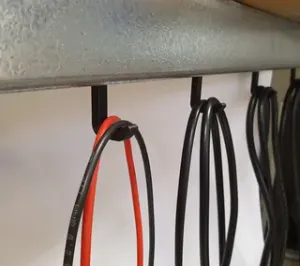 Cable hanging hook for metal storage rack
