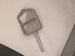 Detergent scoop with options for 20 plus 20 mL