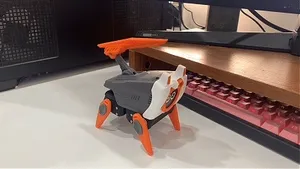 Desktop Embodied AI Pet: Open-Source Robo-Dog RIG-Puppy | Voice Wake-up, Waist Twisting & Cute Gestures, Lightsaber Effects