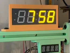 Display holder for an Adafruit 1.2" 4-Digit 14-Segment Display w/I2C Backpack