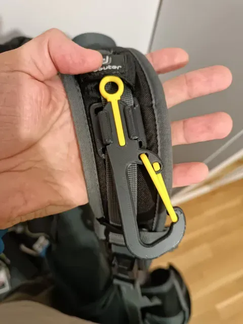QUICK-CLIP system carabiner for a backpack
