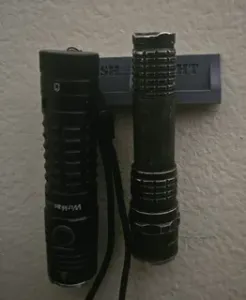 Flashlight wall mount