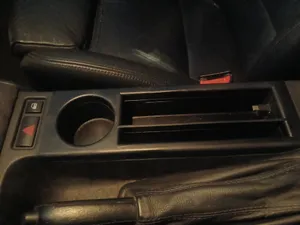 BMW E46 Center console bin with retractable charger.