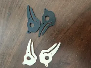 Raven Skull Earring — flat silhouette dangle, mirrored pair, no supports