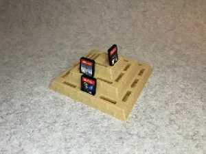 Pyramid style Nintendo Switch game cartridge stand