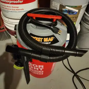 Bucket head vaccuum accessories holder and accesories.