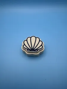 Shell shaped Clicker