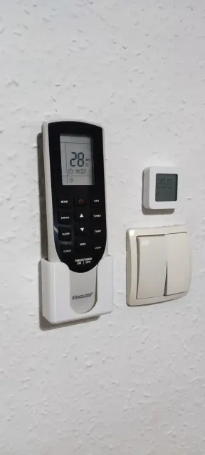 Wall mounted air conditioning remote control holder