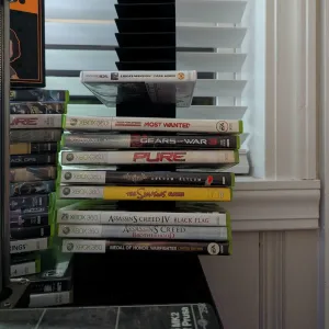 DVD/Xbox 360 and Wii game case holder (8-case and 16 _case)