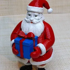Santa Claus with a gift - Swięty Mikołaj z prezentem