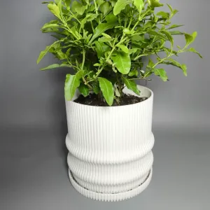 Simple flowerpot with integrated pot holder and reservoir
