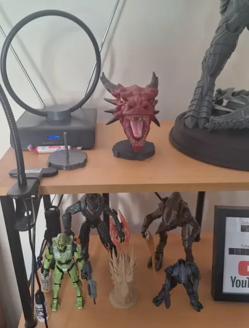 Large dragon head sculpture 3D model on stand