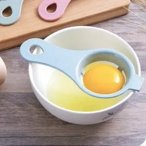 Spoon to separate yolk from egg white