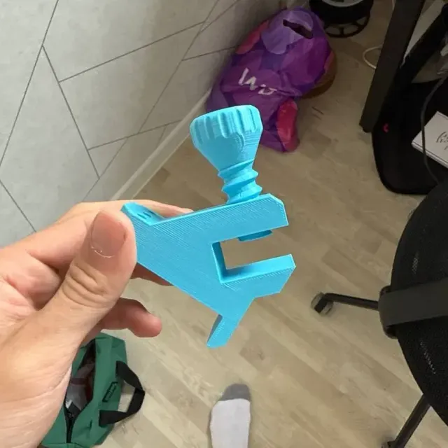 Fixture for cutting ceramic tiles at a 45-degree angle