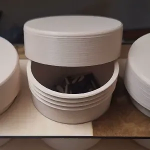 a jar with a threaded lid