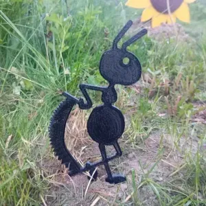 Garden figure of an ant with a saw