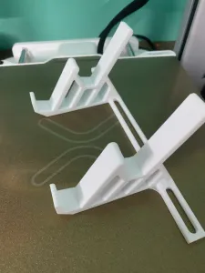 Keyboard stand with a geometric design.