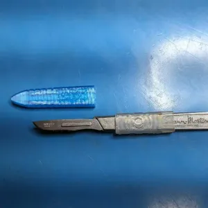 Scalpel blade sheath