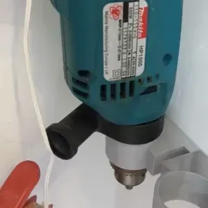 UNIVERSAL HOLDER FOR DRILLS AND OTHERS