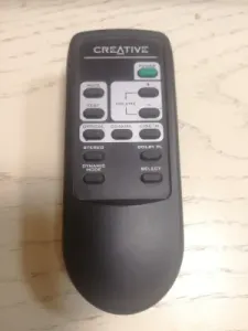 Creative remote control battery cover