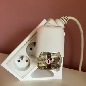 Vertical Multi-Socket Stand (*3) (e.g., Anti-Mosquito Plug)