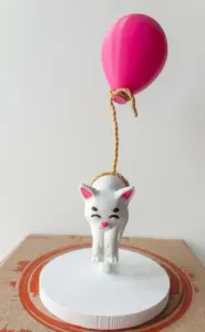 Floating Cat with Balloon