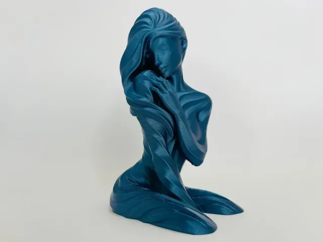 Wavy lady statue — Image 2 of 4