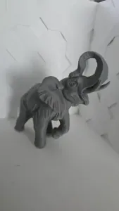 Elephant with Raised Trunk – Decorative Elephant Figurine
