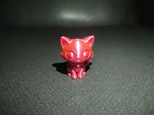 Tiny Chibi Cat Figurine With Big Eyes Pointy Ears Curled Tail