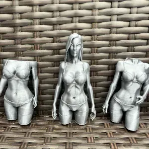 3 mannequins of girls in swimsuits